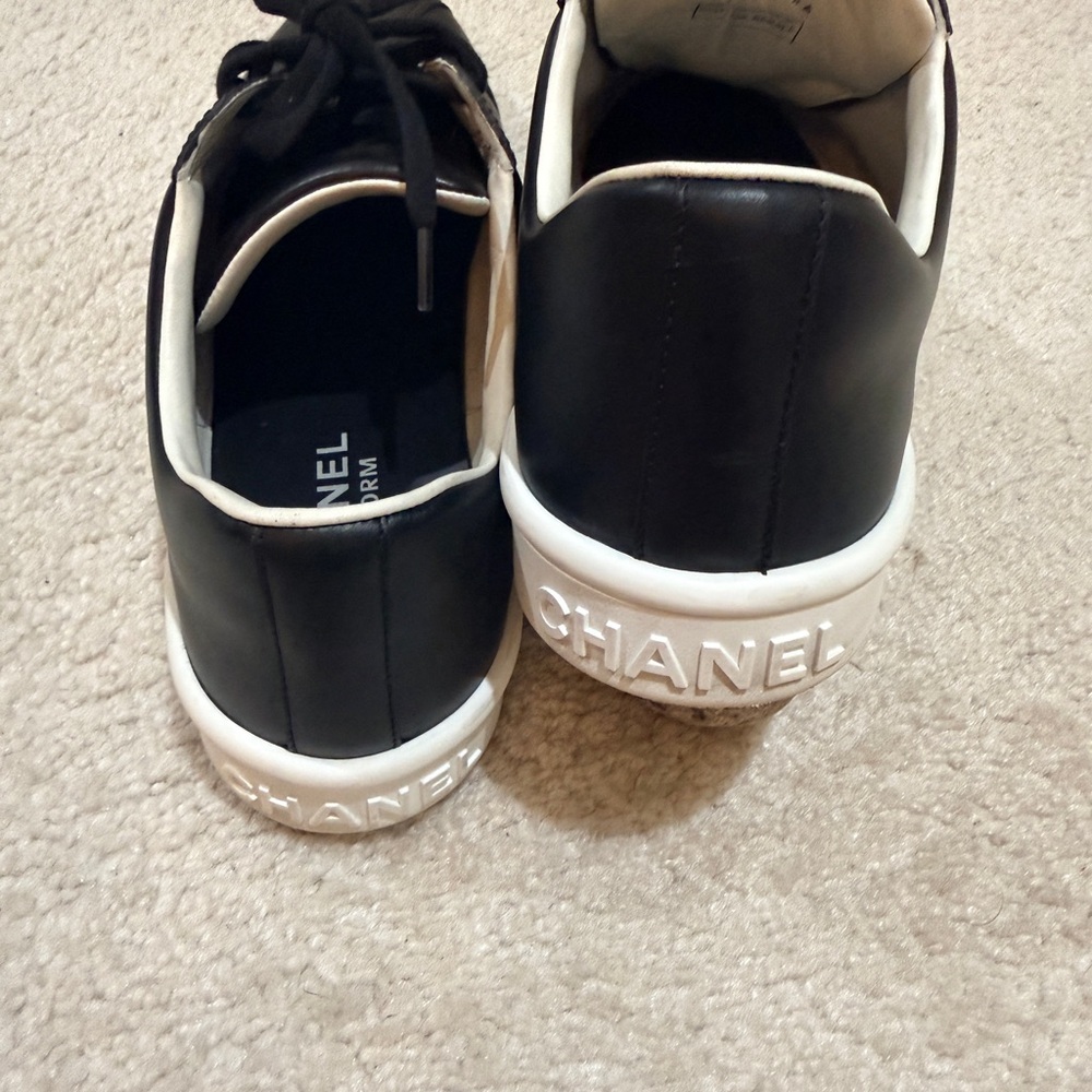 CHANEL Black Leather Low-Top Sneakers with White Sole Accent - Picture 11 of 14